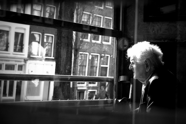 Old-man-staring-out-window-14171645229_b291647d44_z
